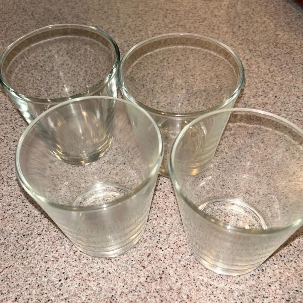 Four small water bottles